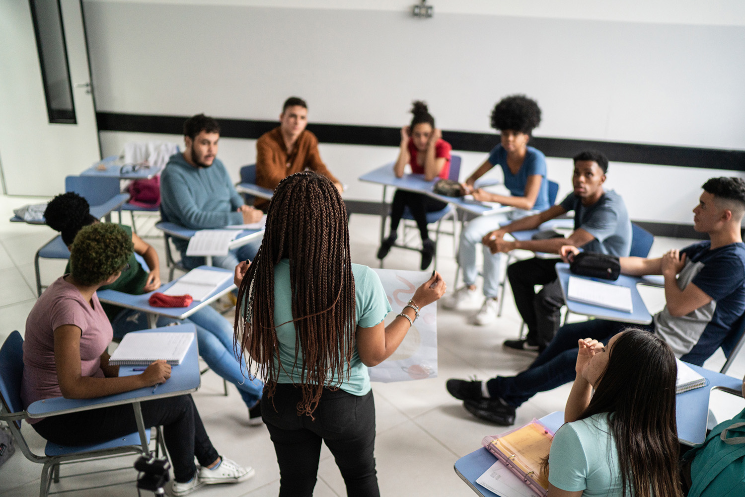 student-presenting-in-front-of-peers